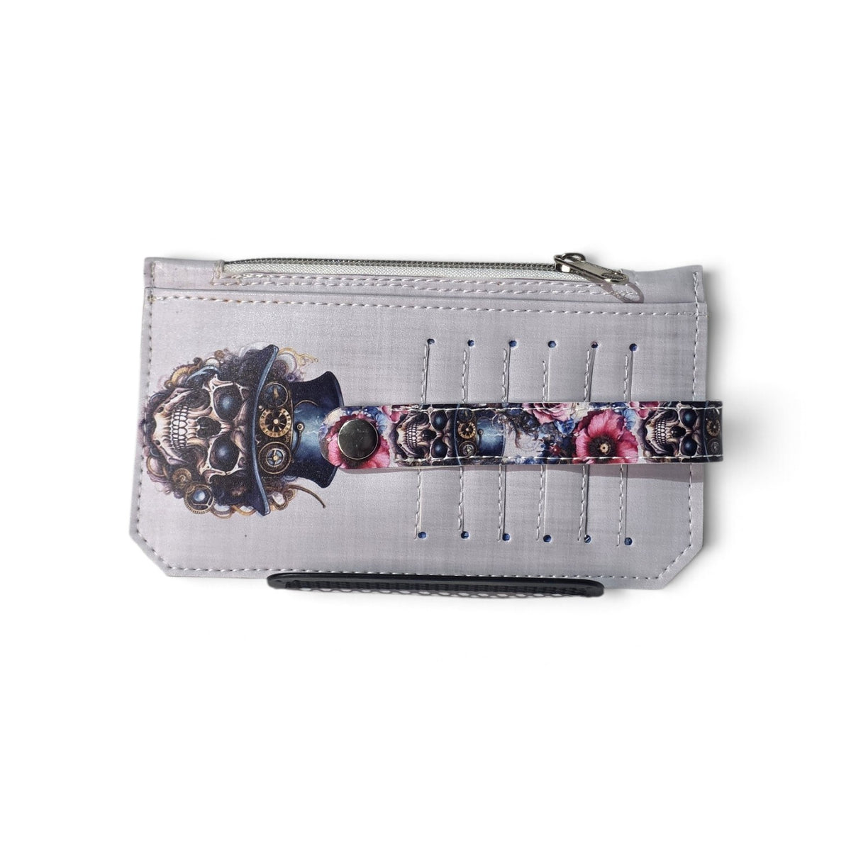 Back of gothic steampunk skull wallet showing exterior card slots, matching skull artwork, and coordinating snap closure.