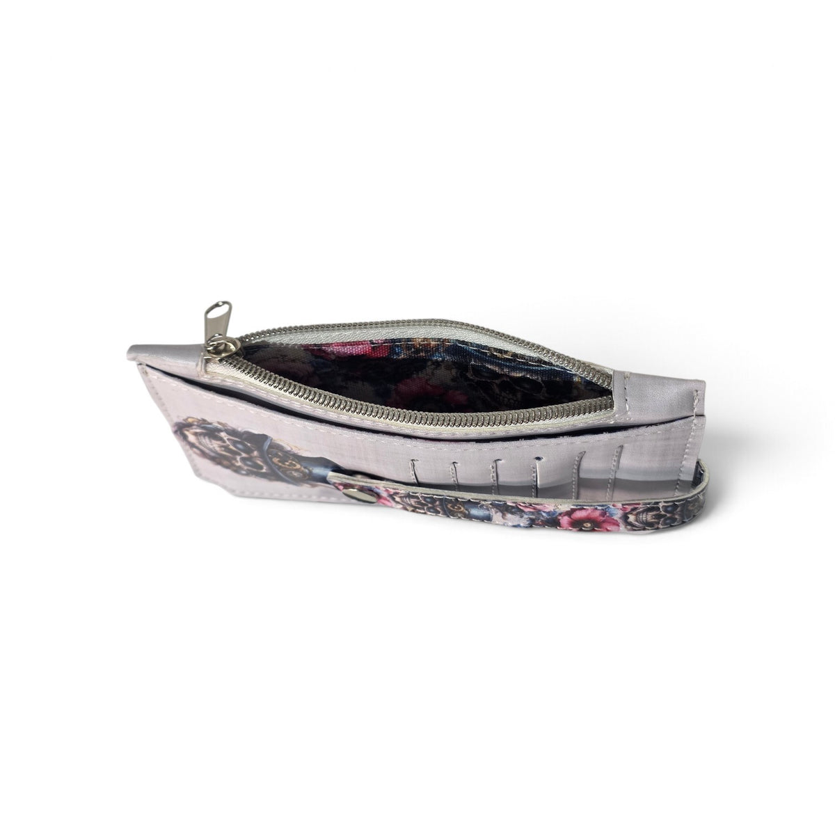 Top view of gothic Purse Pal wallet showing open zippered compartment and dark floral-patterned lining.
