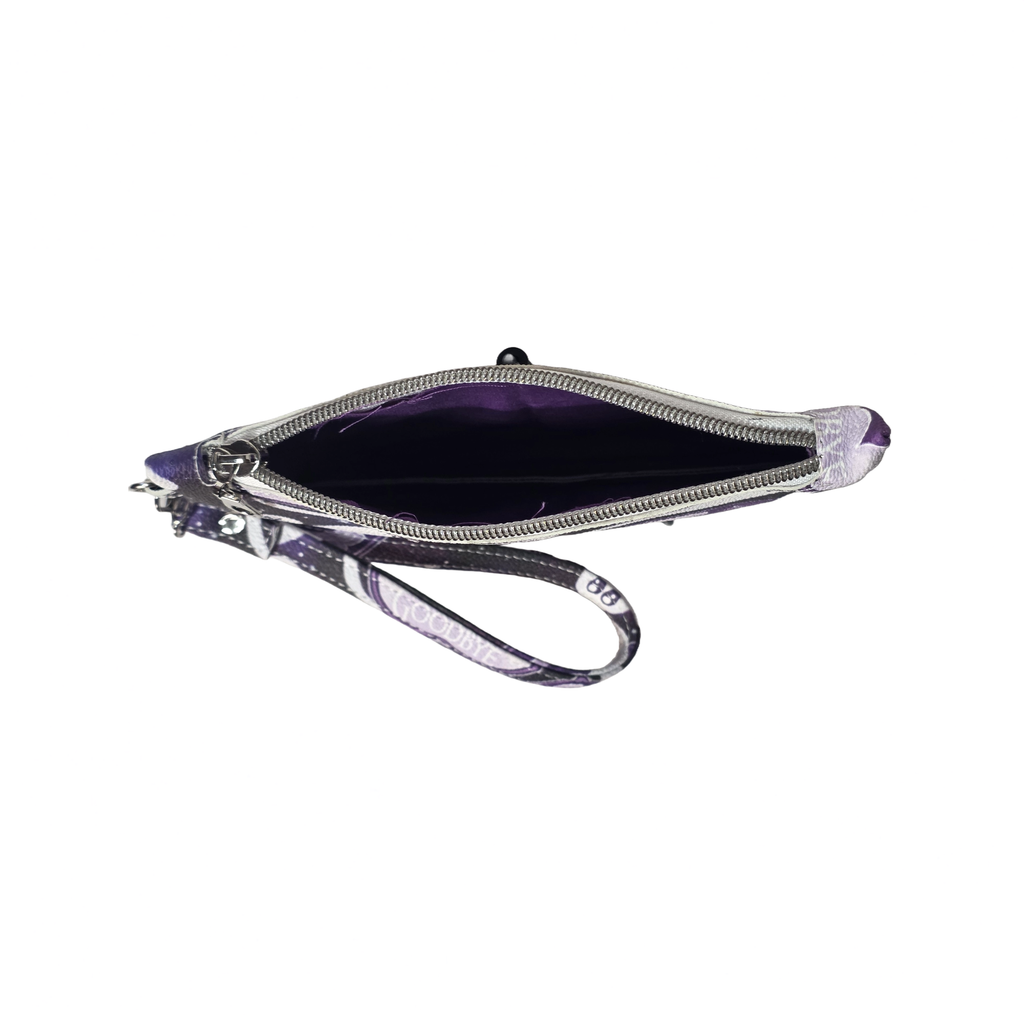A purple wristlet pouch with a silver zipper and a matching purple-and-white patterned wrist strap, shown open against a plain white background.