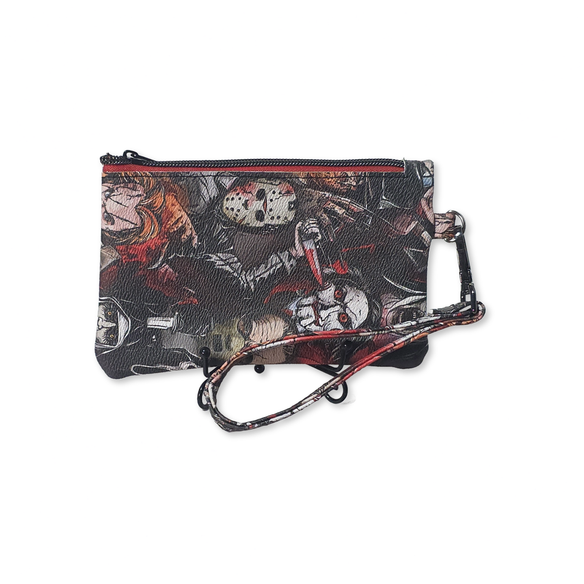 A small zip pouch clutch with a horror movie graphic print featuring Jason Voorhees and Freddy Krueger, with a matching wristlet strap, shown on a plain white background.